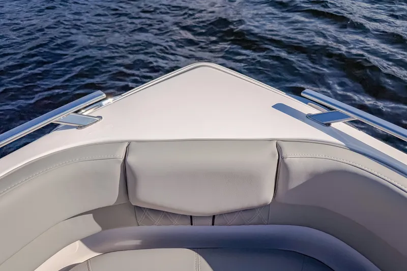 Slide: The Image of Bow seating of 2027 Monterey Elite 27 OB boat on water. - 60