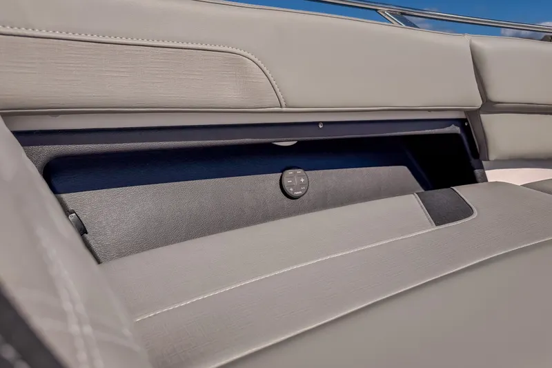 Slide: The Image of 2027 Monterey Elite 27 OB boat interior storage compartment with sleek design and modern features. - 59