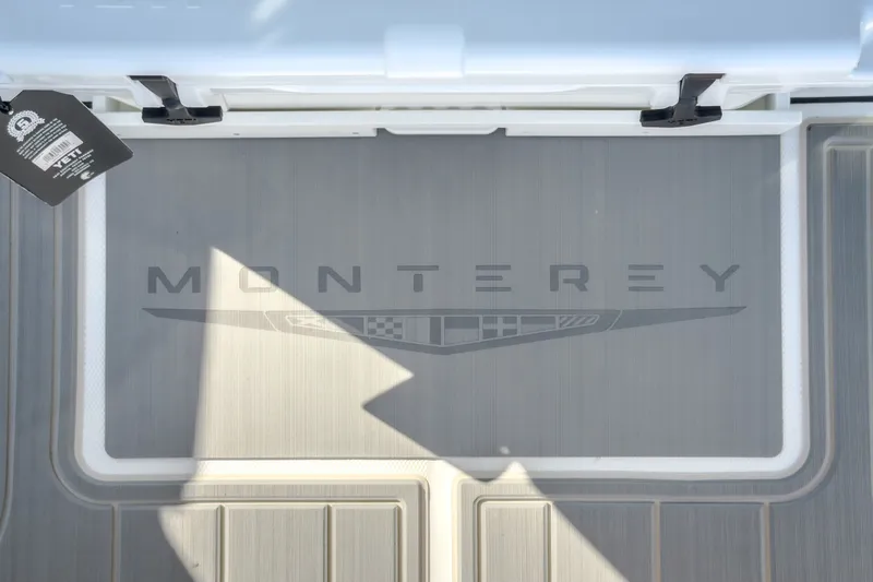 Slide: The Image of Monterey Elite 27 OB 2027 boat deck with logo and Yeti tag. - 36