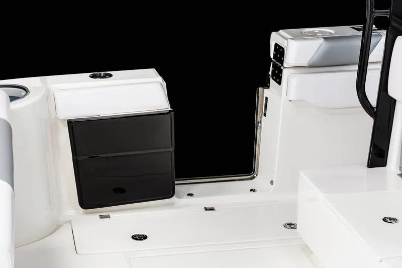 Slide: The Image of Manufacturer Provided Image: 2025 Robalo R302 Center Console boat interior, featuring sleek white and black design elements. - 18