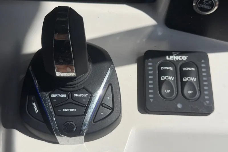 Slide: The Image of Joystick and Lenco control panel on 2025 Robalo R302 Center Console boat. - 34