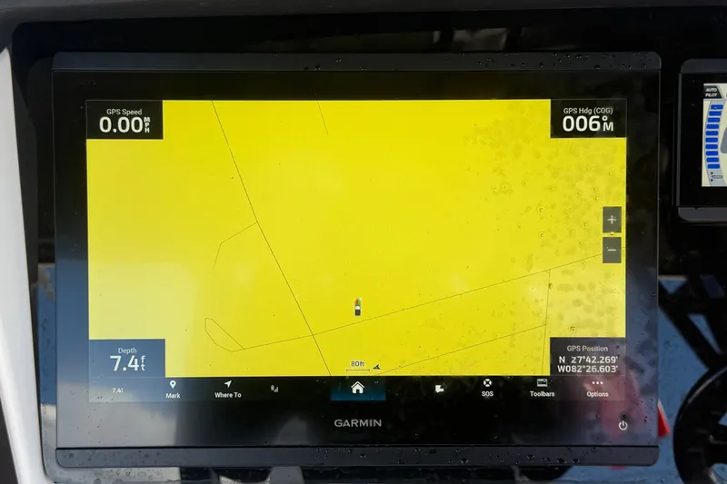 Slide: The Image of Garmin GPS display on 2025 Robalo R302 Center Console boat, showing navigation details. - 28