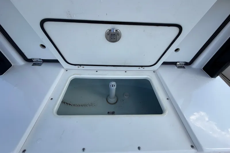 Slide: The Image of Livewell compartment on 2025 Robalo R302 Center Console boat. - 20