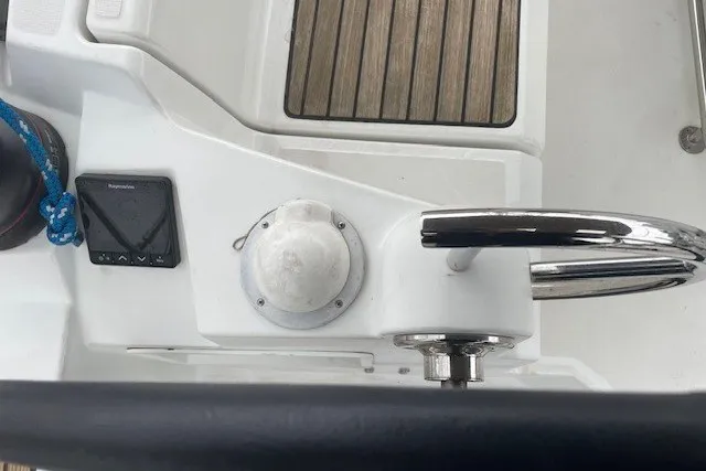 Slide: The Image of Steering wheel and controls of 2017 Jeanneau Sun Odyssey 389 sailboat cockpit. - 17