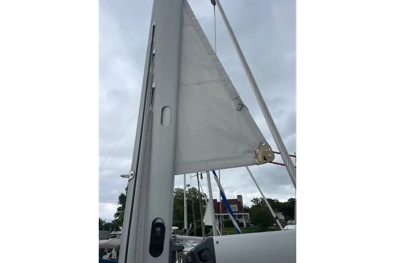 Slide: The Image of Close-up of Jeanneau Sun Odyssey 389 sailboat mast and sail, 2017 model. - 19