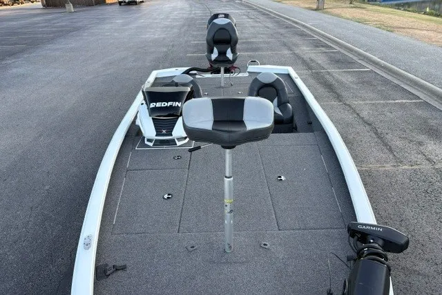 Slide: The Image of 2022 Vexus AVX2080 fishing boat with Garmin equipment, parked on a paved surface. - 22