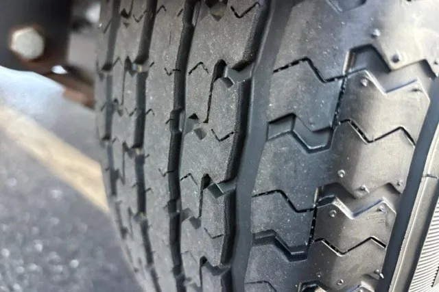 Slide: The Image of Close-up of a 2022 Vexus AVX2080 tire tread pattern. - 67