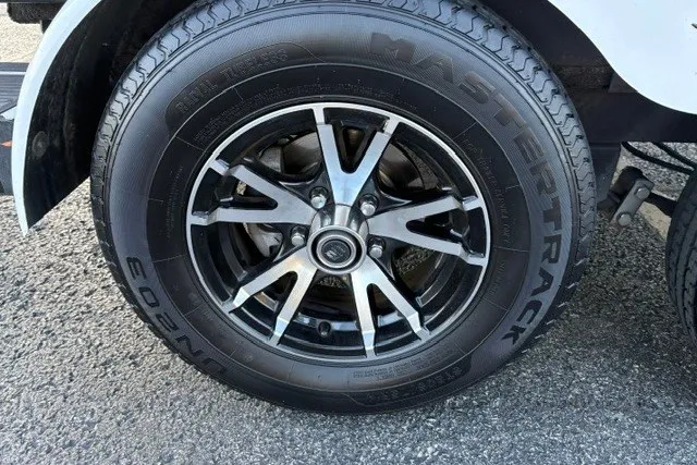 Slide: The Image of 2022 Vexus AVX2080 wheel with Mastertrack tire on asphalt surface. - 68
