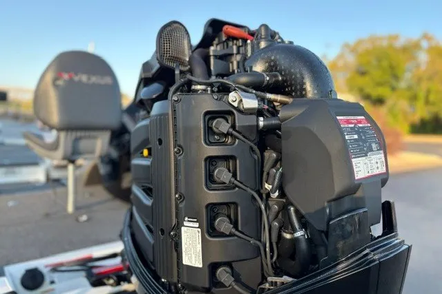 Slide: The Image of 2022 Vexus AVX2080 boat engine close-up with branded seat in background. - 13