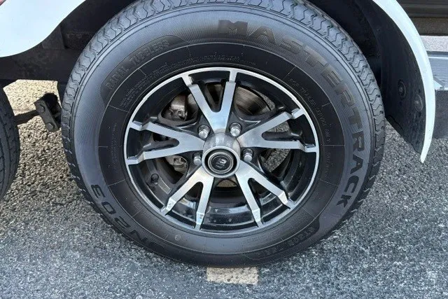Slide: The Image of 2022 Vexus AVX2080 wheel with Mastertrack tire on asphalt surface. - 69
