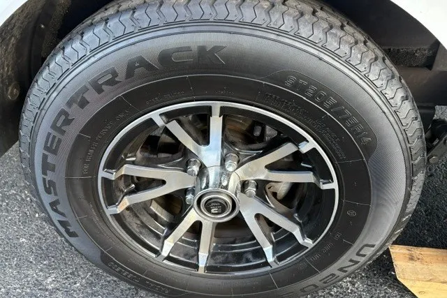 Slide: The Image of Close-up of a 2022 Vexus AVX2080 wheel with Mastertrack tire on asphalt. - 70