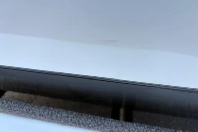 Slide: The Image of Close-up of a 2022 Vexus AVX2080 boat detail, showcasing sleek design and craftsmanship. - 59