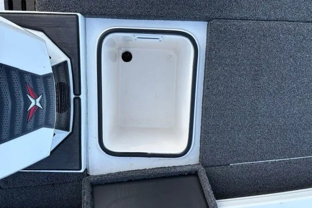 Slide: The Image of 2022 Vexus AVX2080 boat storage compartment with textured flooring and sleek design. - 43