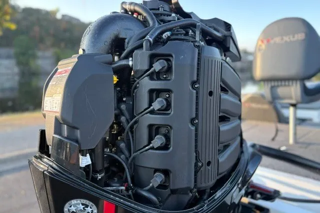 Slide: The Image of 2022 Vexus AVX2080 boat engine close-up with visible components and branding. - 15