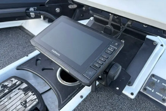 Slide: The Image of Garmin display on 2022 Vexus AVX2080 boat dashboard, featuring control panel and cup holder. - 50