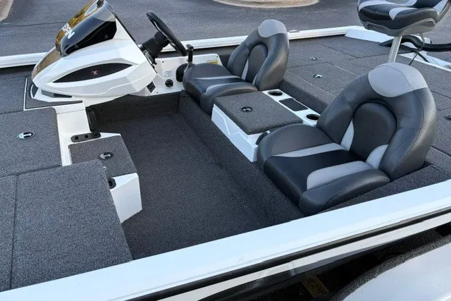 Slide: The Image of 2022 Vexus AVX2080 boat interior with dual seats and modern dashboard design. - 26