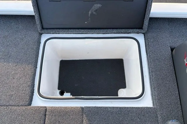 Slide: The Image of 2022 Vexus AVX2080 boat storage compartment with carpeted interior and open lid. - 34