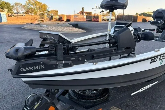 Slide: The Image of 2022 Vexus AVX2080 boat with Garmin equipment, parked on a trailer in a lot. - 27
