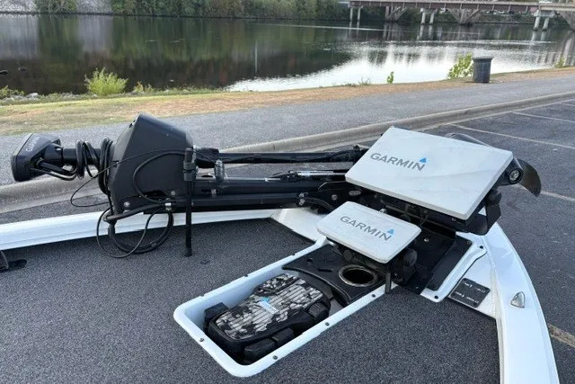 Slide: The Image of 2022 Vexus AVX2080 boat with Garmin electronics, parked by a scenic riverside. - 54