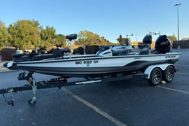 Slide: The Image of 2022 Vexus AVX2080 boat on trailer in parking lot, side view. - 58