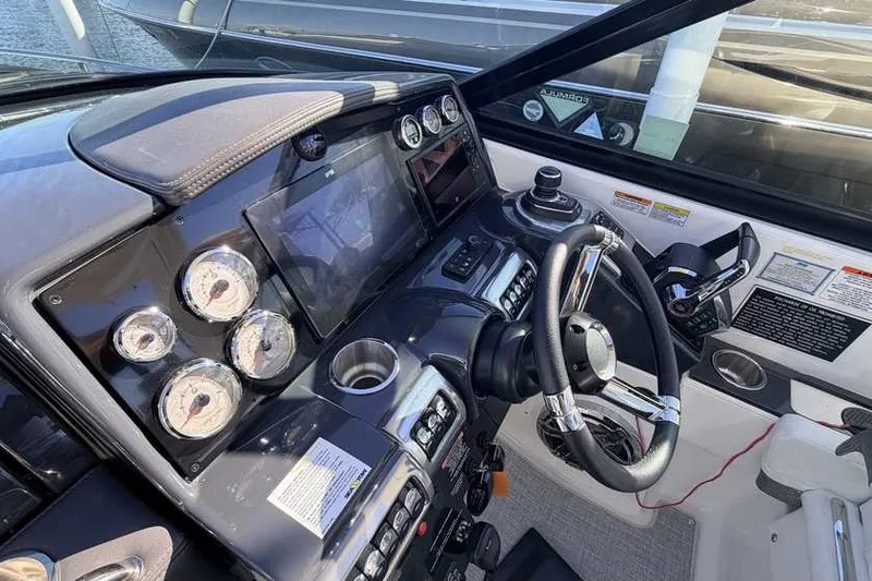 Slide: The Image of 2023 Formula 350 Crossover Bowrider I/O dashboard with modern controls and gauges. - 43