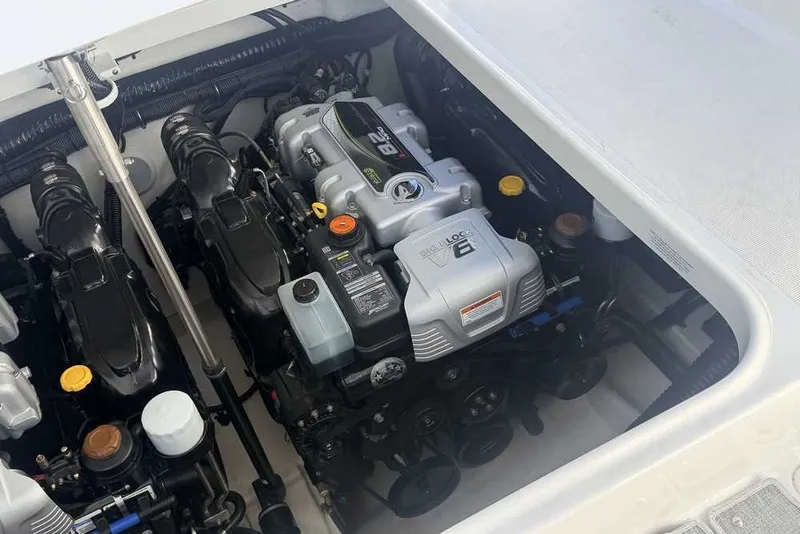 Slide: The Image of Engine compartment of 2023 Formula 350 Crossover Bowrider I/O, showcasing powerful engine components. - 19