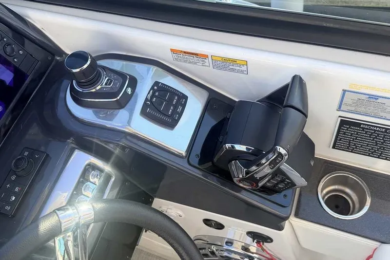 Slide: The Image of Control panel of 2023 Formula 350 Crossover Bowrider I/O with joystick and throttle. - 23