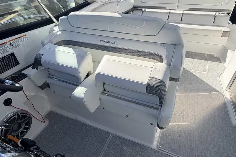Slide: The Image of 2023 Formula 350 Crossover Bowrider I/O interior with luxurious seating and modern design. - 48