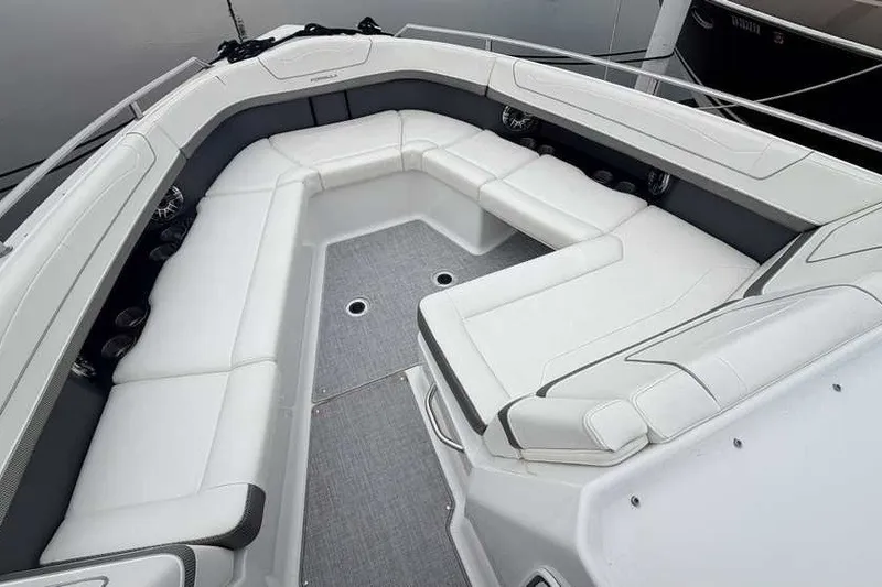 Slide: The Image of 2023 Formula 350 Crossover Bowrider I/O with spacious white seating area. - 55