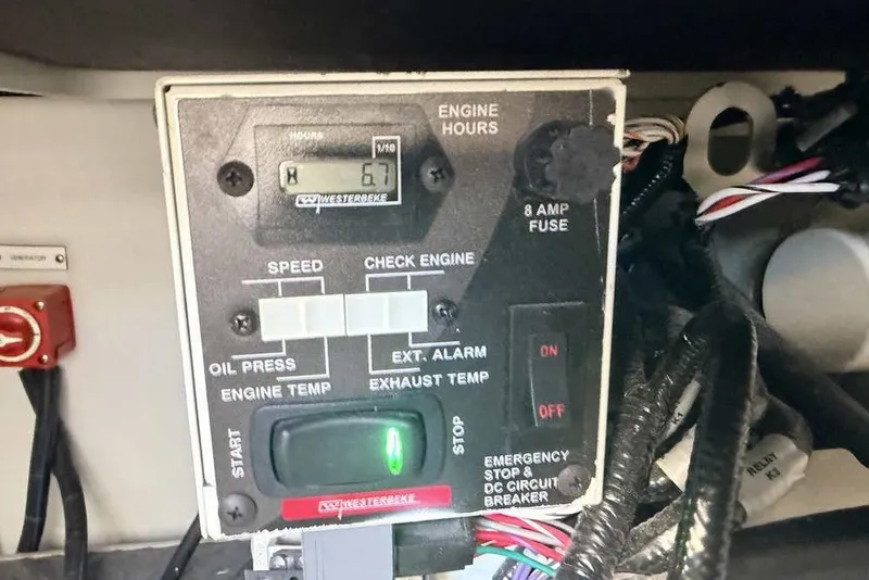 Slide: The Image of Control panel of a 2023 Formula 350 Crossover Bowrider I/O with engine hours display. - 17