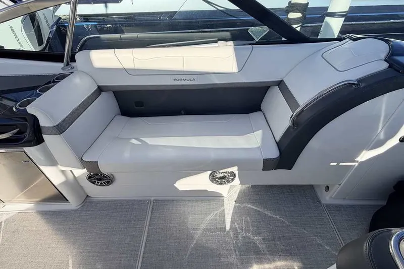 Slide: The Image of 2023 Formula 350 Crossover Bowrider I/O interior seating with sleek white upholstery. - 28