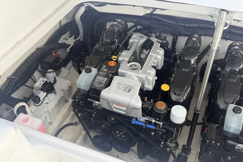 Slide: The Image of Engine compartment of 2023 Formula 350 Crossover Bowrider I/O, featuring a powerful V8 engine. - 18