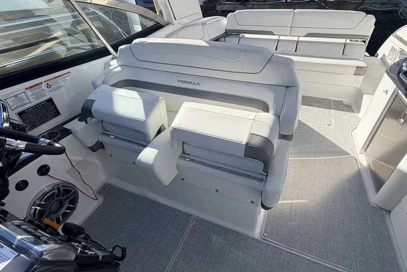 Slide: The Image of 2023 Formula 350 Crossover Bowrider I/O interior with luxurious seating and modern design. - 26