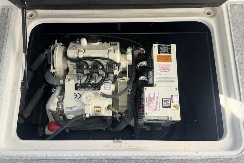 Slide: The Image of Engine compartment of 2023 Formula 350 Crossover Bowrider I/O, showcasing mechanical components. - 38