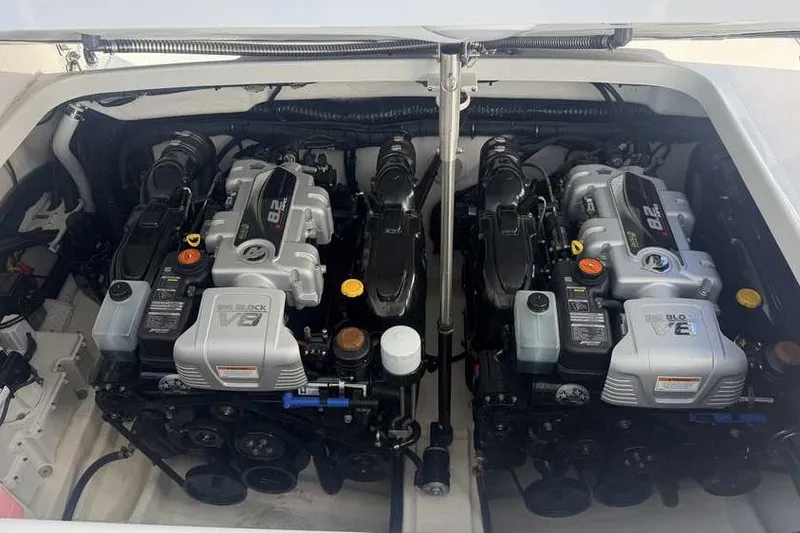 Slide: The Image of Twin engines of a 2023 Formula 350 Crossover Bowrider I/O, showcasing powerful V8 design. - 42