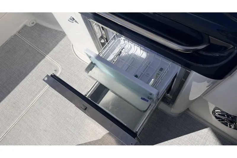 Slide: The Image of 2023 Formula 350 Crossover Bowrider I/O with open drawer refrigerator. - 32