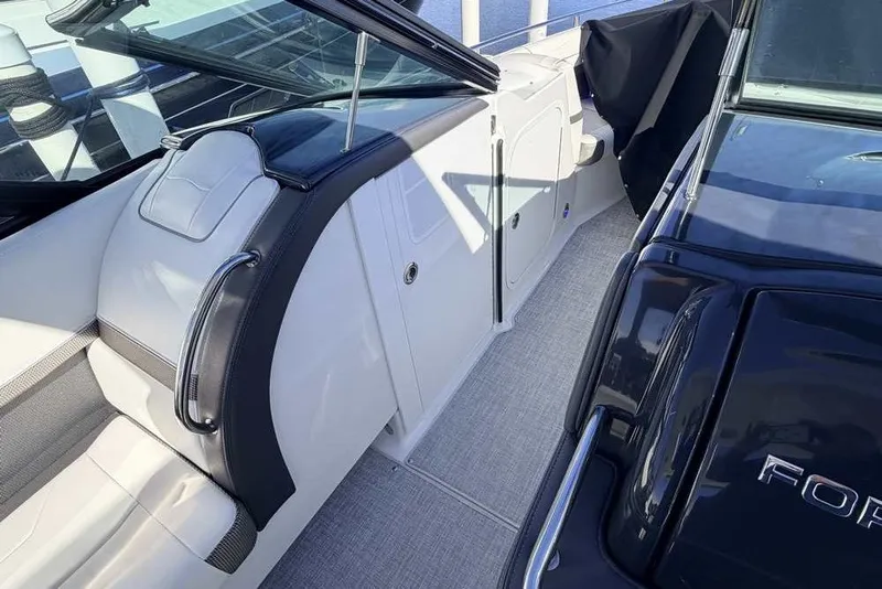 Slide: The Image of 2023 Formula 350 Crossover Bowrider I/O interior with sleek seating and modern design. - 15