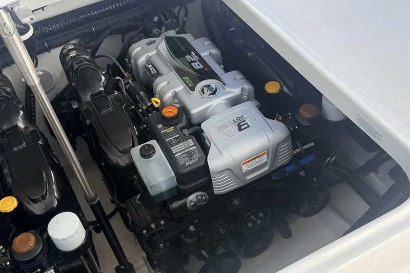 Slide: The Image of Engine compartment of 2023 Formula 350 Crossover Bowrider I/O, showcasing powerful V8 engine. - 41
