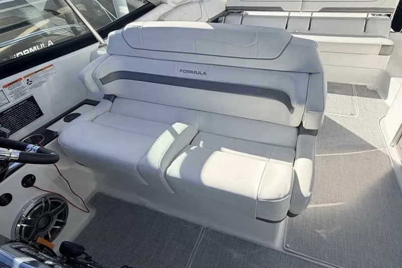 Slide: The Image of 2023 Formula 350 Crossover Bowrider I/O interior with luxurious white seating. - 49