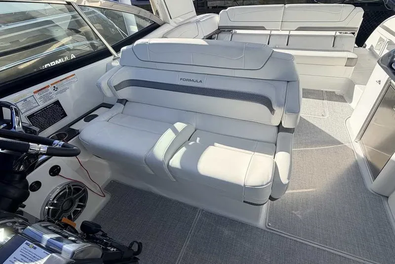 Slide: The Image of 2023 Formula 350 Crossover Bowrider I/O interior with luxurious seating and modern design. - 27