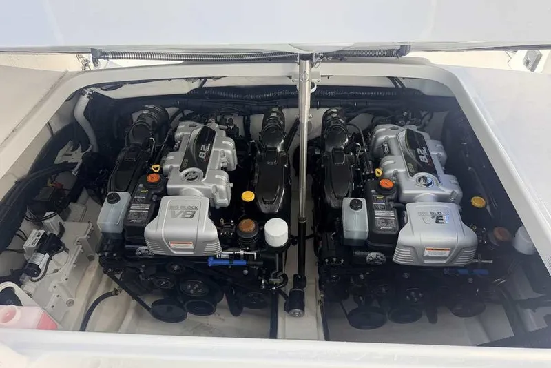 Slide: The Image of Twin V8 engines in a 2023 Formula 350 Crossover Bowrider I/O boat. - 20