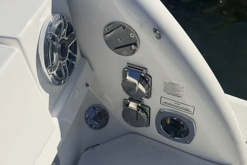 Slide: The Image of 2023 Formula 350 Crossover Bowrider I/O boat controls and speaker detail. - 7