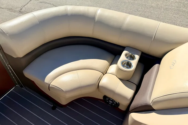 Slide: The Image of Luxurious seating on 2021 Manitou 23 Oasis pontoon boat with cup holders and premium upholstery. - 66