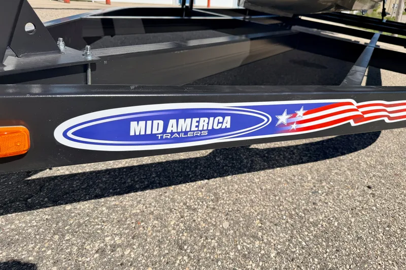 Slide: The Image of Trailer with "Mid America Trailers" logo, featuring stars and stripes design. - 113