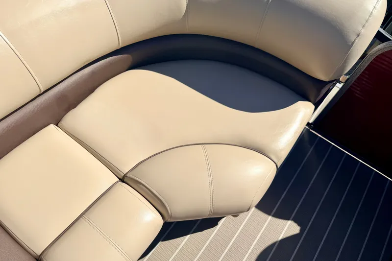 Slide: The Image of Luxurious beige seating on 2021 Manitou 23 Oasis boat, showcasing premium upholstery. - 72