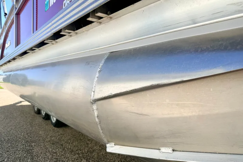 Slide: The Image of 2021 Manitou 23 Oasis pontoon boat with aluminum hull detail. - 14
