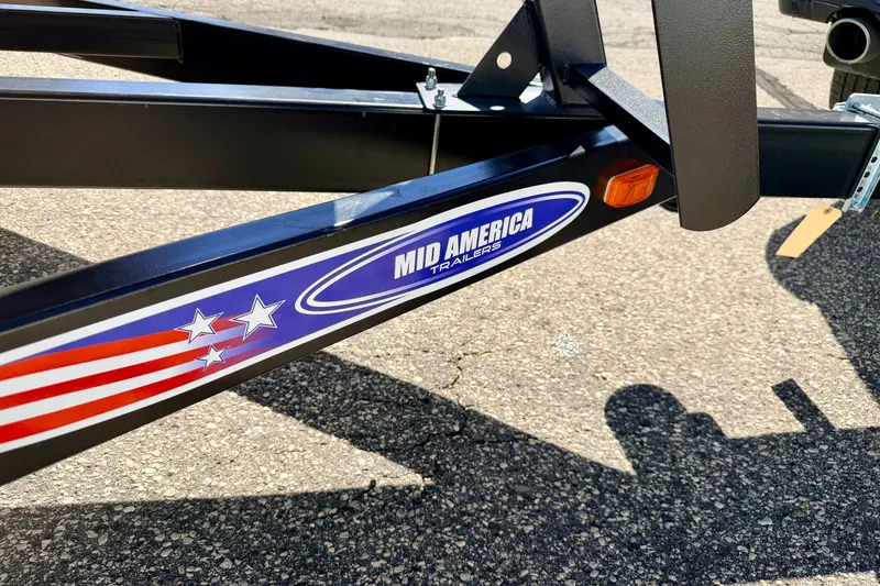 Slide: The Image of Trailer with "Mid America Trailers" logo, part of a 2021 Manitou 23 Oasis. - 98