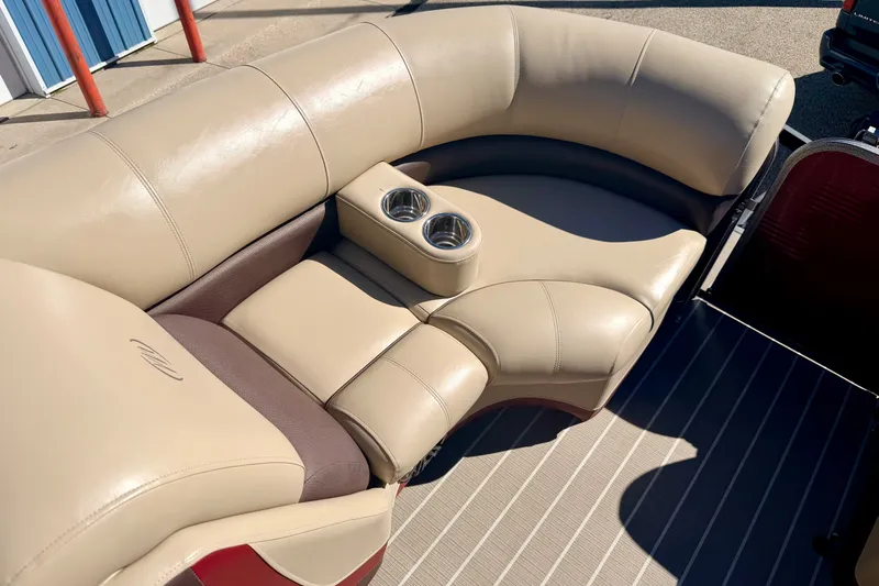 Slide: The Image of Luxurious seating on 2021 Manitou 23 Oasis boat with cup holders. - 71