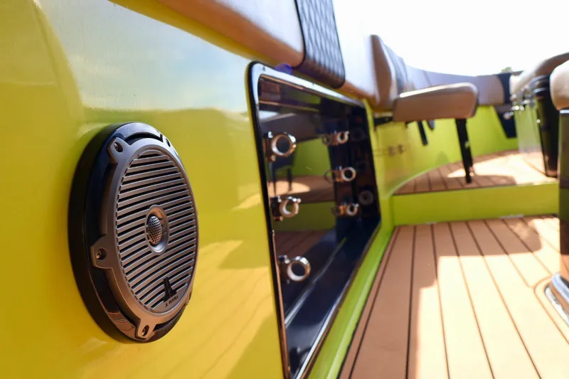Slide: The Image of Close-up of a 2016 Midnight Express 43 Open boat interior with speaker and seating. - 10