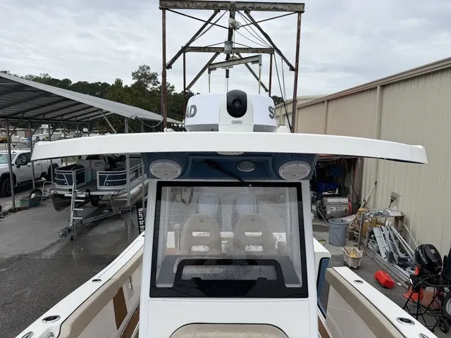 Slide: The Image of A 2024 Sea Pro 262 Center Console boat is in a storage area. - 13